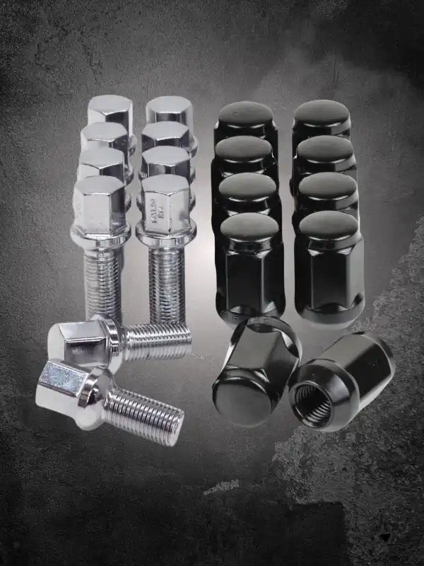 Chrome and black wheel lug nuts with threaded bolts.