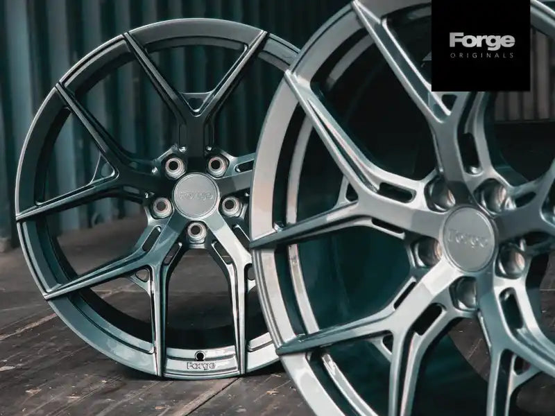 Forge-branded alloy wheels with a split-spoke design in metallic finish.